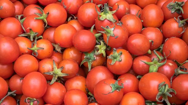 The close up of fresh tomatoes vegetable at street food market in Taipei, Taiwan.