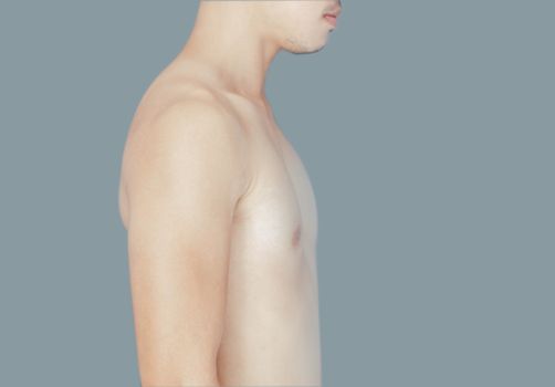 Side view of body asian man skin isolated with grey background, health care and medical concept