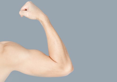 Back arm muscle man with grey background, health care and medical concept