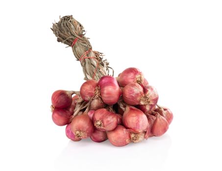 Red dried onions on white background, raw food ingredient
