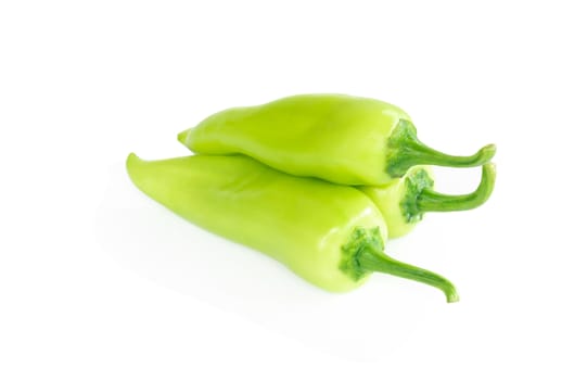 Green chilli pepper on white background, raw food ingredient concept
