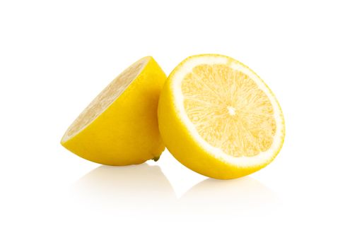 Closeup fresh lemon fruit slice isolated on white background, food and healthy concept