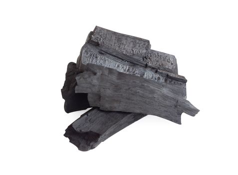 Natural black charcoal isolated on white background