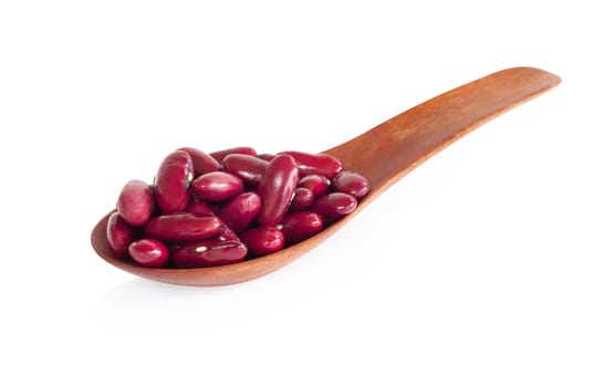 Red kidney beans in wood spoon isolated on white background, healthy food concept