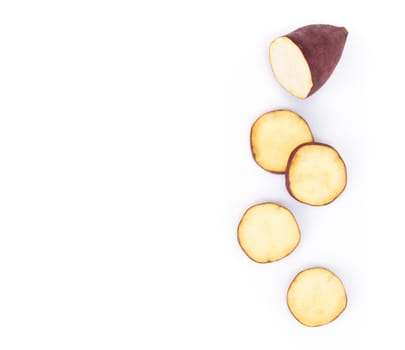 Top view raw sweet potato isolated on white background, healthy food concept