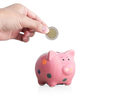 Pink ceramic piggy bank on white background, saving money concept
