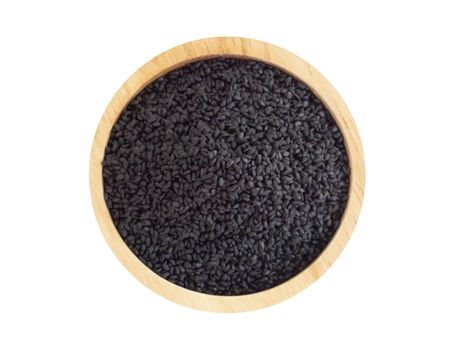 Top view black sesame seeds in wooden bowl on white background, healthy food concept