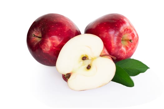 Fresh red apple fruit with green leaf isolated on white background, Healthy food concept