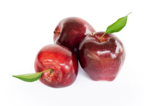 Fresh red apple fruit with green leaf isolated on white background, Healthy food concept