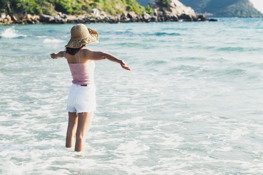 Closeup woman looking to sea with relax feeling in tropical summer season, Hoilday concept