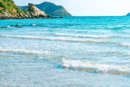 Sea wave breaking with rocky beach, Holiday and relax time concept, selective focus