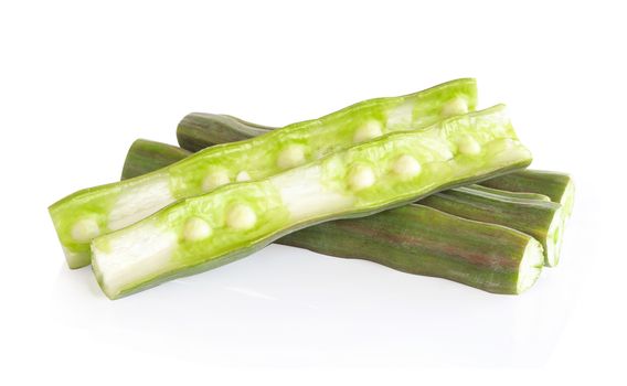 Moringa pods isolated on white background, herb and medical concept