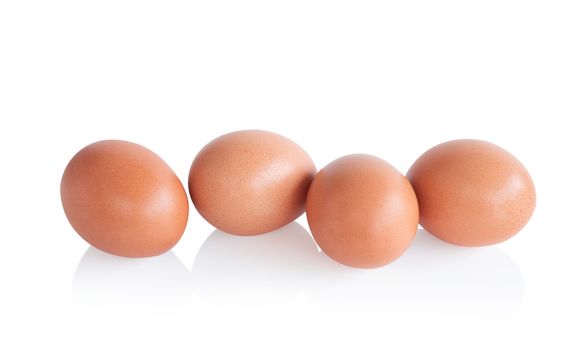 Raw chicken eggs on white background with clipping path