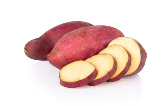 Raw sweet potato isolated on white background, healthy food concept