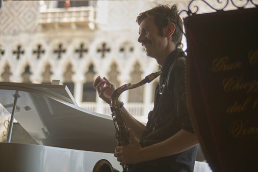 VENICE, ITALY 25 MARCH 2019: Street musicians plays in Venice