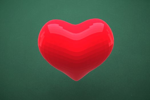 A Red heart against green