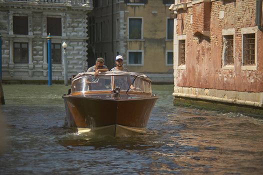 VENICE, ITALY 25 MARCH 2019: Motorboat on the Venice canal