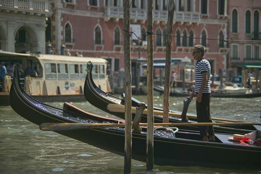 VENICE, ITALY 25 MARCH 2019: Gondola in Venice with people on board