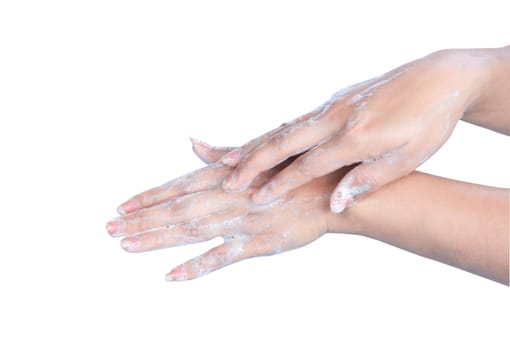 Closeup woman's hand washing with soap on white background, health care concept