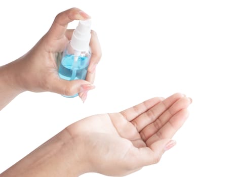 Woman hand using alcohol spray in plastic bottle for washing hand, health care and medical concept