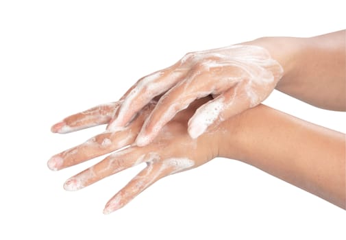 Closeup woman's hand washing with soap on white background, health care concept