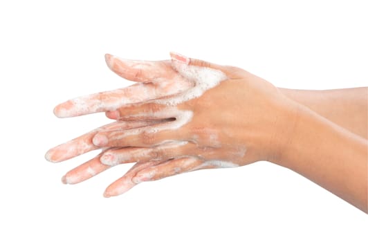 Closeup woman's hand washing with soap on white background, health care concept