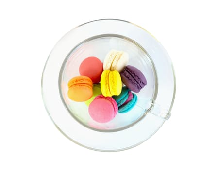 Top view Colorful magaroons in glass isolated on white background, sweet and dessert concept