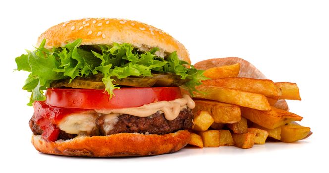 One big tall classic hamburger burger cheeseburger with french fries isolated on white background