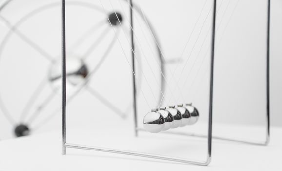 balancing balls on a white background. business concept. Newtons Cradle