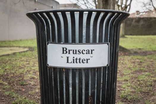 Trash timber litter bin Bruscar in a public park in Ireland near Dublin