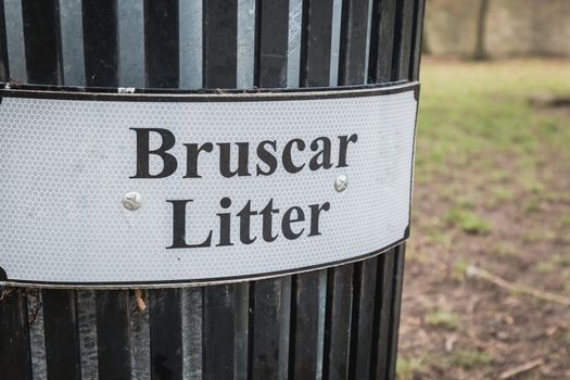 Trash timber litter bin Bruscar in a public park in Ireland near Dublin
