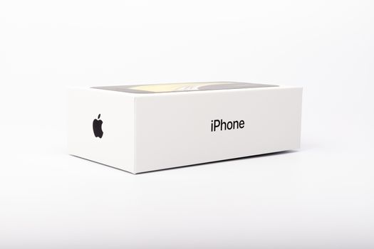 Paris, France - May 14, 2020: packaging of the new black iPhone SE 2020 from the multinational company Apple during the days of its studio release on a white background