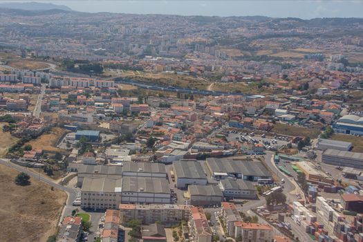 flight over the city of Lisbon by plane. Portugal in summer
