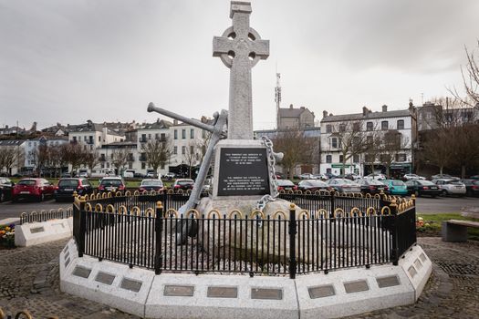 Howth near Dublin, Ireland - February 15, 2019: view of the monument was erected by the Howth fishermans association and commemorates the lives of all persons lost at sea in the city center on a winter day