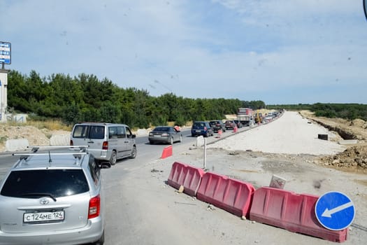 Construction of a new road and transport interchange. Work on reinforced concrete structures and road surface.
