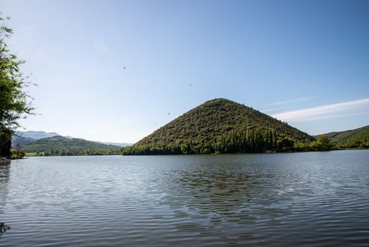 piediluco lake with view of the island in the middle of the lake