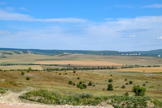 Crimean landscapes, driving on the roads of Crimea. Suburbs and villages and fields and trails of The Crimea.