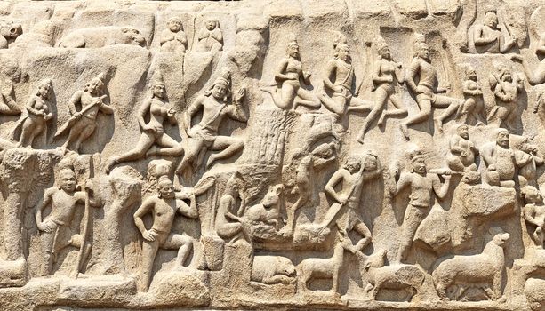 Descent of the Ganges is one of the Group of Monuments at Mahabalipuram and it is a UNESCO World Heritage Site. It is a giant open-air rock cut bas relief sculptures carved on two monolithic rocks. The story depicted in the relief is the descent of the sacred river Ganges to earth from the heavens. The relief was created by Narasimhavarman-1 to celebrate the victory over Chalukiya king. There are 146 sculptures of animals, God, people and half-humans carved in the rock relief.