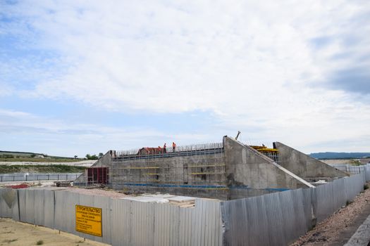 Reinforced concrete construction road junction. a Road construction and bridges.