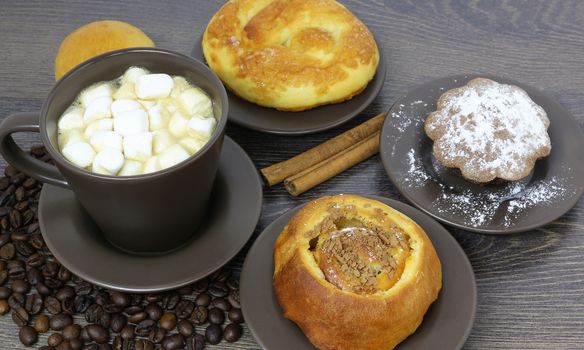 A Cup of coffee with scones and marshmallows