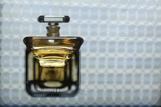 Perfume bottle with golden cap