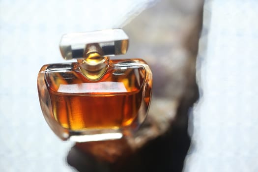 Perfume bottle with golden cap