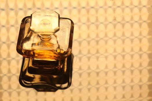 Perfume bottle with golden cap