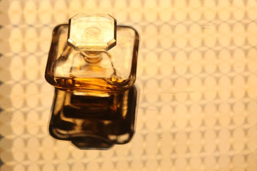 Perfume bottle with golden cap