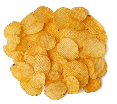 heap of corrugated round yellow fried potato chips isolated on white background, food with spice, top view