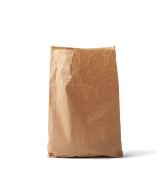 open and full paper disposable bag of brown kraft paper isolated on white background, concept of rejection of plastic packaging, template for designer, packaging for contactless product delivery