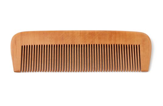 wooden hairbrush isolated on a white background, close up