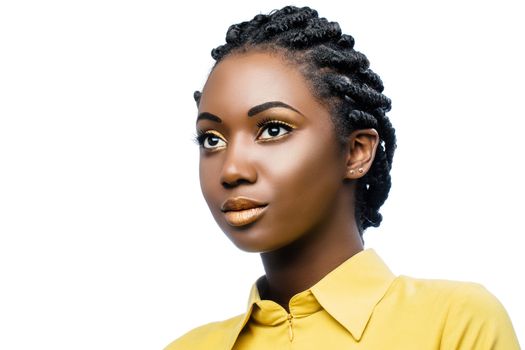 Close up beauty portrait of attractive young african woman wearing professional make up.Girl with stylish braided hairstyle isolated on white background.