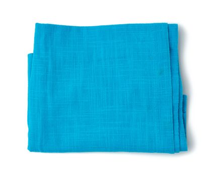 folded blue cotton fabric isolated on white background, top view, close up