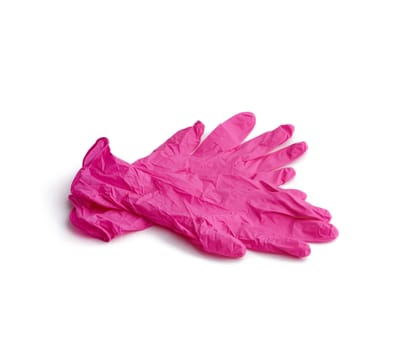 pair of pink latex gloves isolated on a white background, accessory for a cosmetologist doctor, chef